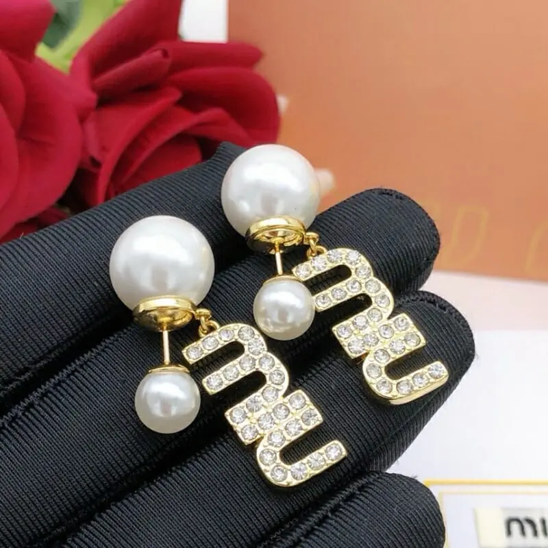 miu miu boucles doreilles pour femme s_121a500